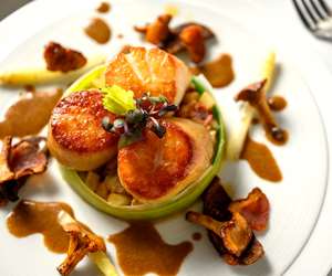 Pan seared Smoked scallops, salpicon of white asparagus & lobster, Iberico chorizo chips, lobster sauce